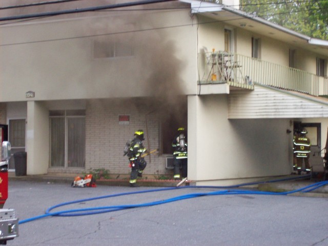 Truck company members going to work venting division one at a fire in Lower Nazareth.